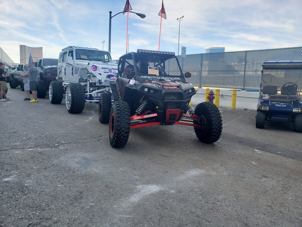 Check out "The Punisher UTV" @oct_tim at the DUB Photoshoot Featuring UTV Speed, Inc., products like the Black Fastback cage with attached rear bumper and much more. 