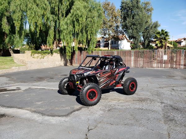 Check out "The Punisher UTV" @oct_tim at the DUB Photoshoot Featuring UTV Speed, Inc., products like the Black Fastback cage with attached rear bumper and much more. 