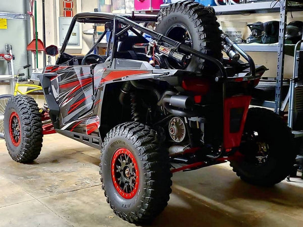 Check out "The Punisher UTV" @oct_tim at the DUB Photoshoot Featuring UTV Speed, Inc., products like the Black Fastback cage with attached rear bumper and much more. 