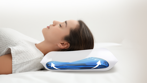 Woman resting on a Mediflow Water Pillow with adaptive waterbase layer.