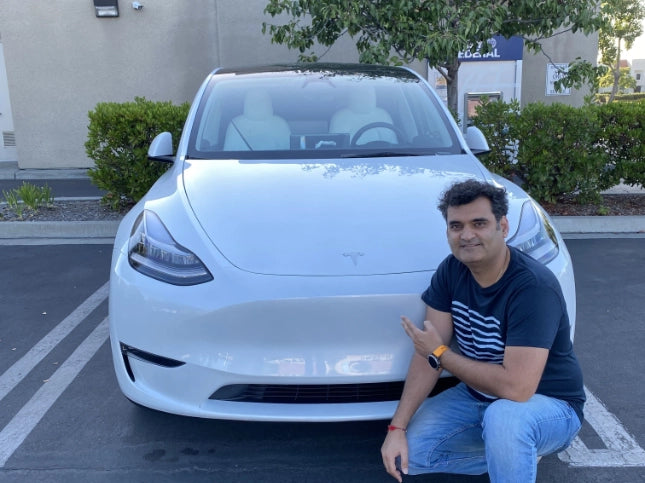 Smiling Tesla Owner Img 1