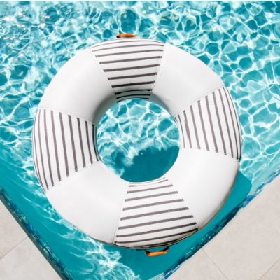 22122108_Big-Joe_Lux-Inflatable-Ring_Inflatable-Pool-Float_Black-and-White-Cape-Stripe_Premier-Mesh_Lifestyle-3.jpg__PID:de9202f1-286b-4169-9a8d-464c9a2b21b7