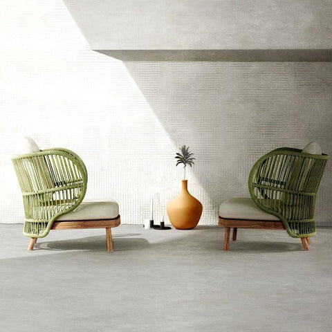 green rattan garden armchair