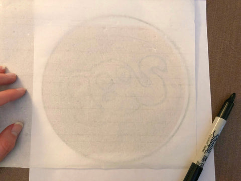 Tracing your original sketch to translucent paper.