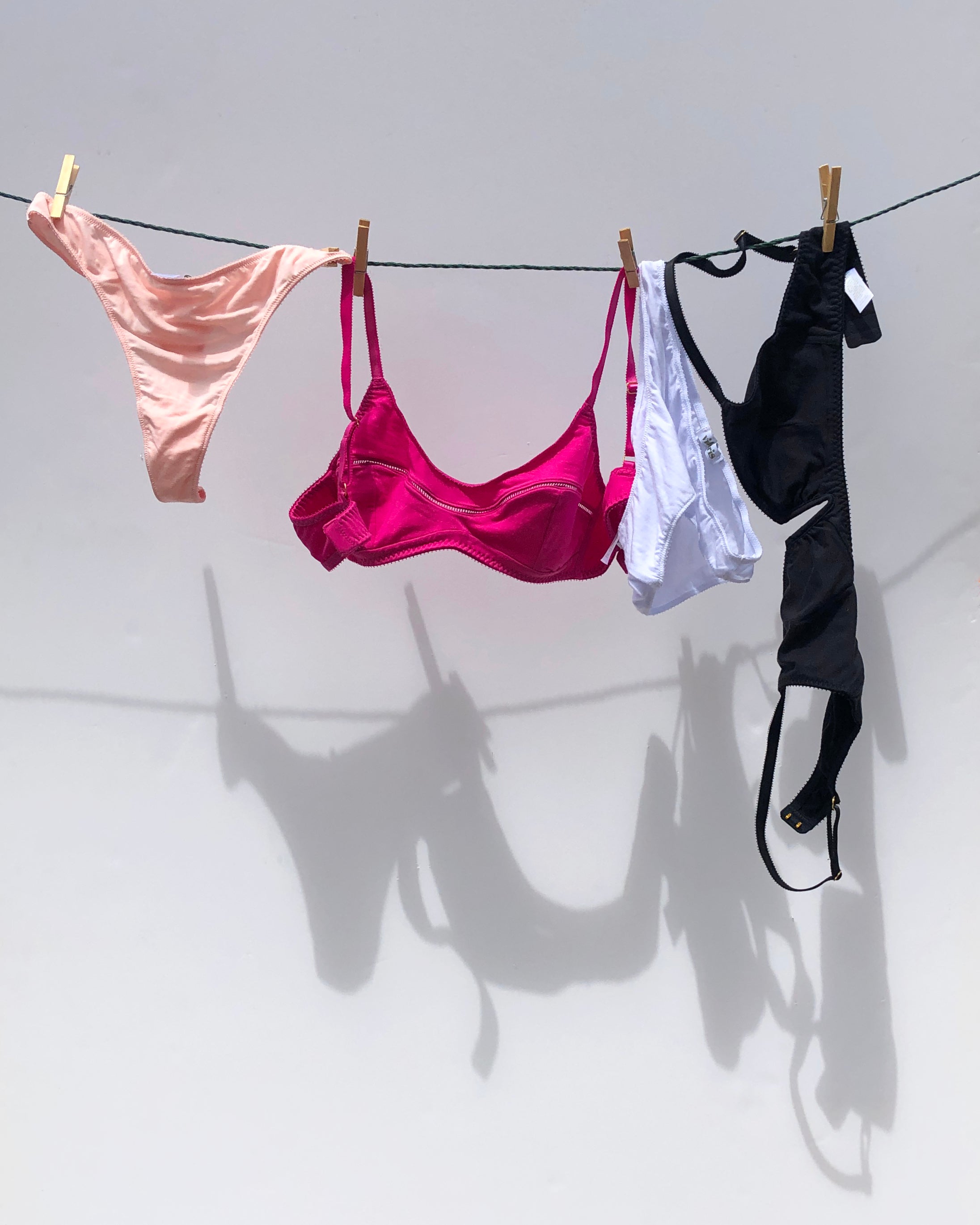 Videris Lingerie soft cup bras and knickers hanging on a line