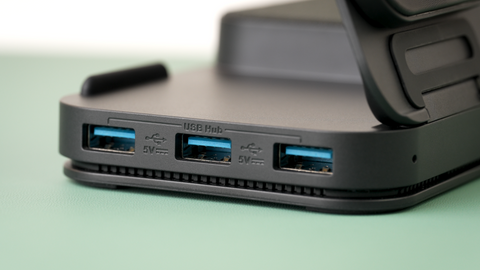 close up view of a built in 3 port hub on the Yealink BH71 wireless headset charge base