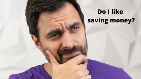 Man wearing Headset Advisor T shirt pondering with words overlayed that says Do I like saving money?