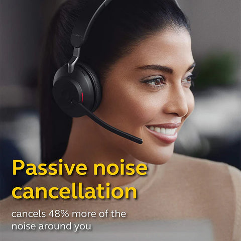 Woman wearing a Jabra double ear wireless headset with the words passive noise cancellation written below
