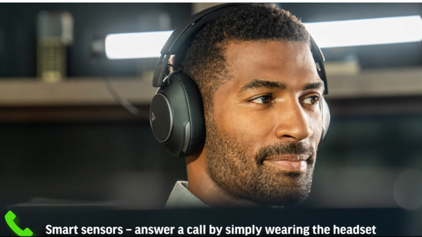 Man  wearing a Jabra Voyager Surround 80 UC with text about its smart sensors