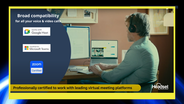 man sitting at his office desk wearing a jabra evolve2 50 wired headset with text that talks about it being compatible with all the leading UC software