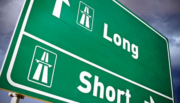 highway sign that says long and short with arrows pointing each way