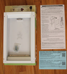 Ideal box contents with instruction manual and pet door and warranty card