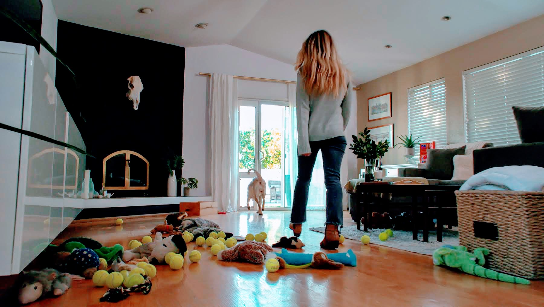 woman in home with dog