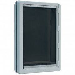 the ideal ruff weather pet door with a black tinted flap and a plastic frame