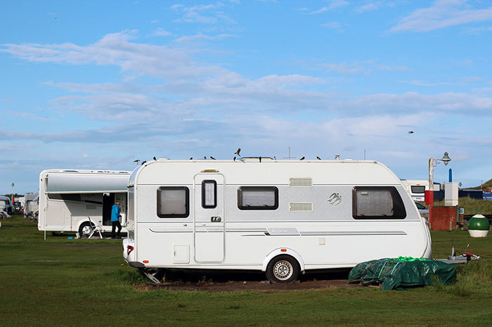 Parked caravan at campsite