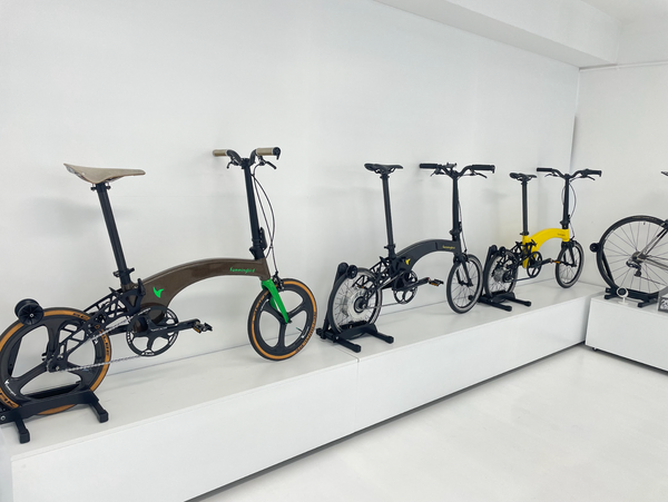three hummingbird bikes lined up in bike.co.uk showroom
