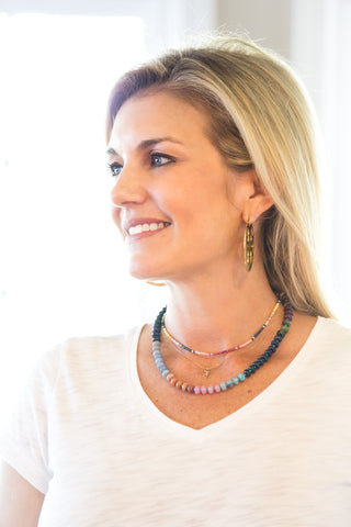 Erin McDermott necklaces on model.