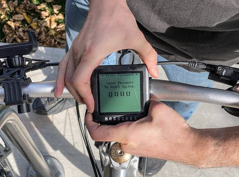 A would-be thief tampers with the e-bike's display screen, but is unable to do much thanks to the password protection feature.