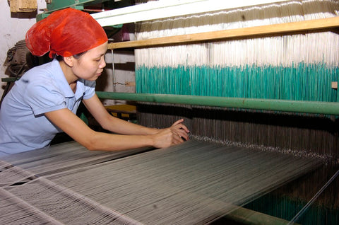 vietnamese girl weaving hand loom luala silk