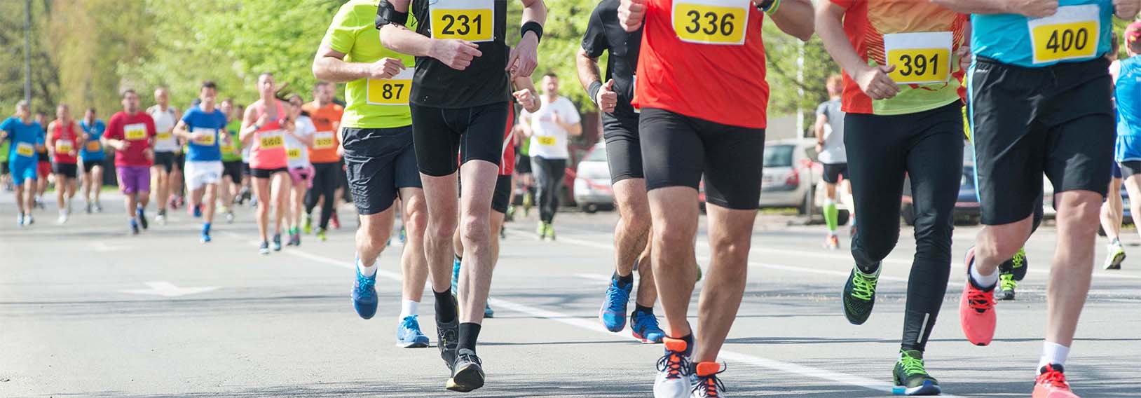 People running a marathon. B.