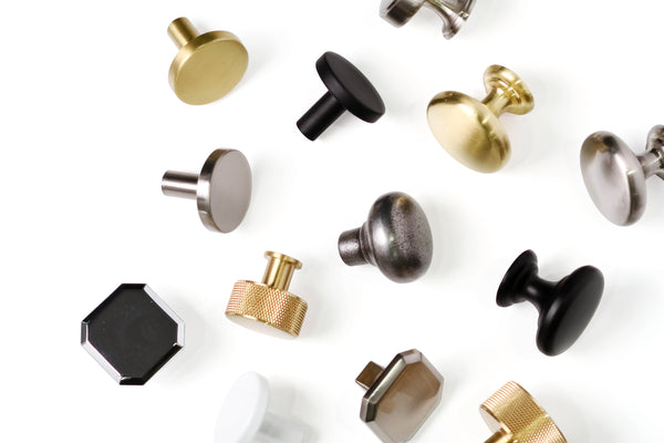 Touch Handles Cabinet Knobs Flat Lay. Including Brass, Black, Dull Brushed Nickel Knobs