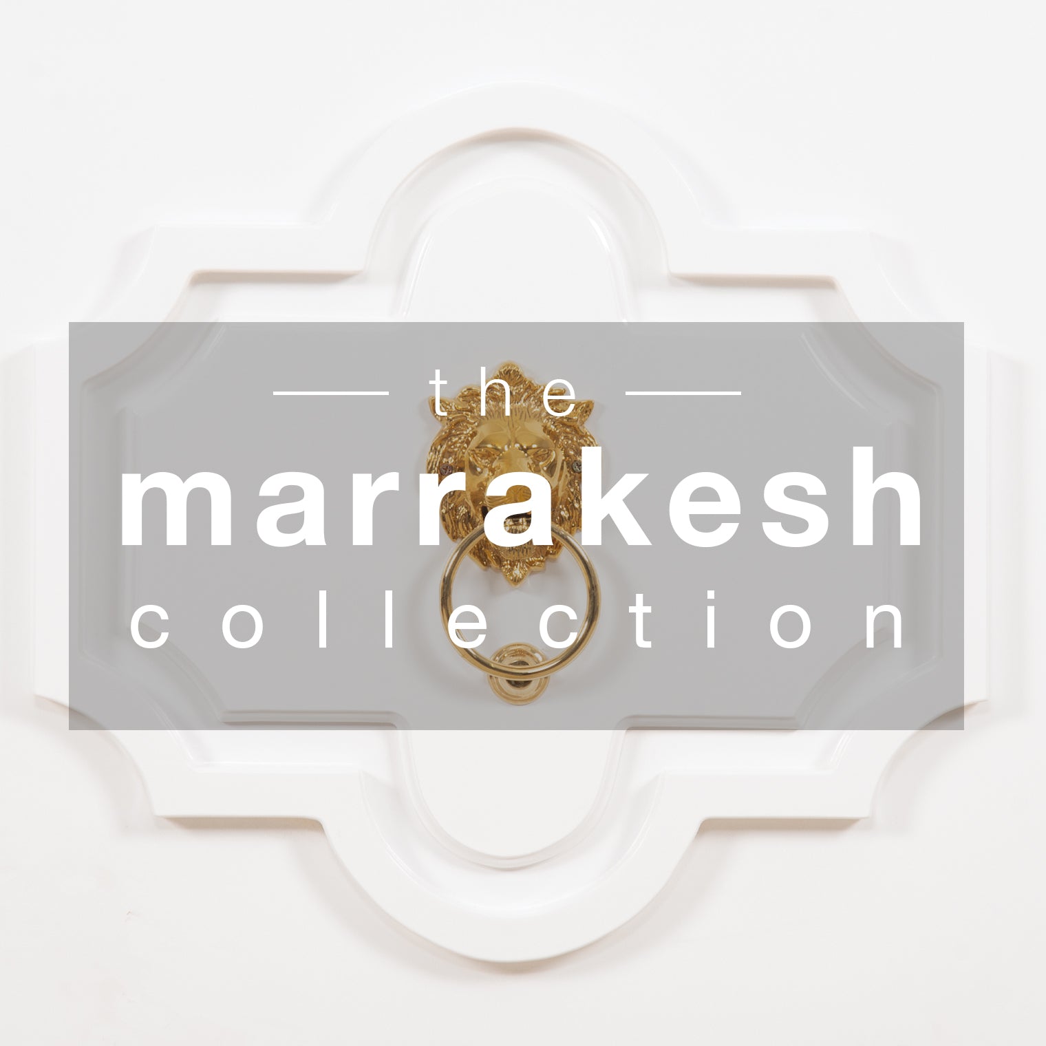 Ornate white door with gold lion door knocker and 'the Marakesh Collection' in white letters on shaded center rectangle