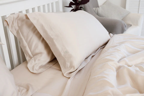 ethical bedding's flat sheet on bed in wheat