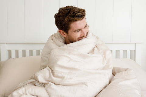 Man wrapped in bamboo duvet