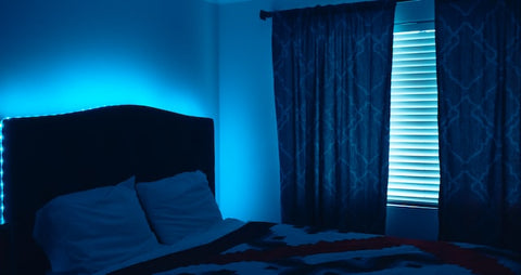 dark bedroom with heavy curtains and blinds