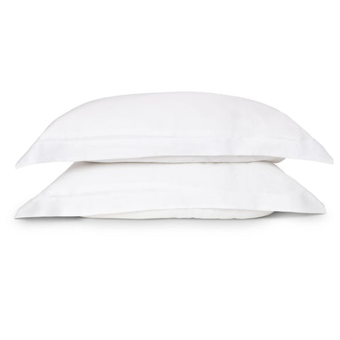 two ethical bedding pillows stacked