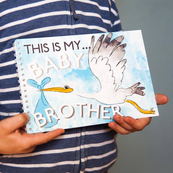 Baby keepsake book for an older sibling