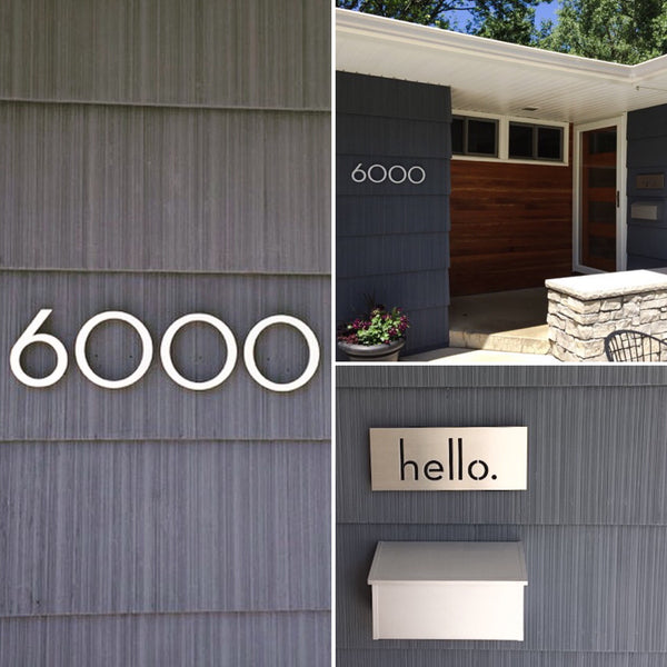 Palm Springs numbers '6000' and 5x16 'hello.' plaque, in Brushed Aluminum, installed on gray siding of a MCM home - Modern House Numbers"