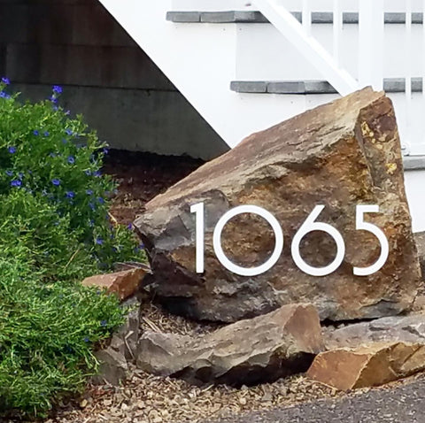 Modern House Numbers Aluminum So Cal Font, 1065, installed on rock
