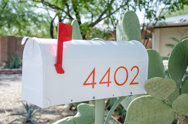 Palm Springs style mailbox numbers in orange vinyl from Modern House Numbers