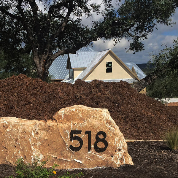 Modern address numbers installed on a boulder, Palm Springs, Matte Black, from Modern House Numbers