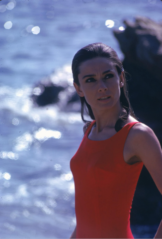 Audrey Hepburn wearing red jantzen swimsuit