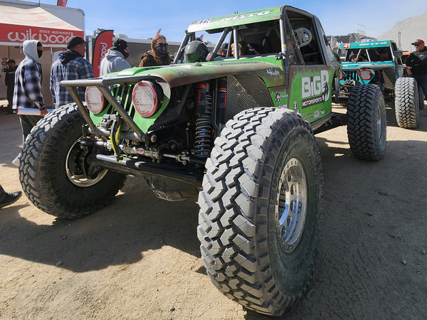 Rusty Blyler's Jeep (green) and son Josh (teal) lined up before the start