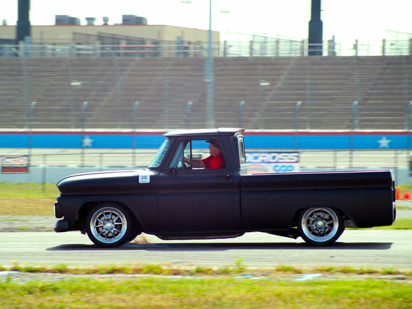 Hard stopping Chevy C10 truck at autocross stop box