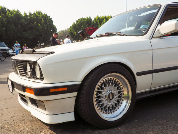 1990 BMW E30 325 with period correct bra and headlight wipers