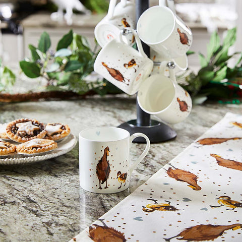 Mugs and tea towel with duck design