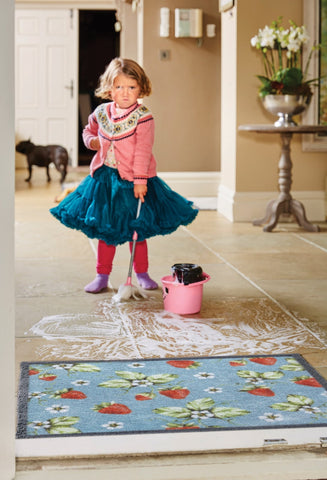 Frowning Girl Cleaning The Floor