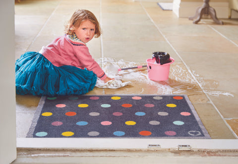 Girl scrubbing the floor