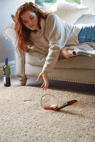 Woman spilling wine on My Rug