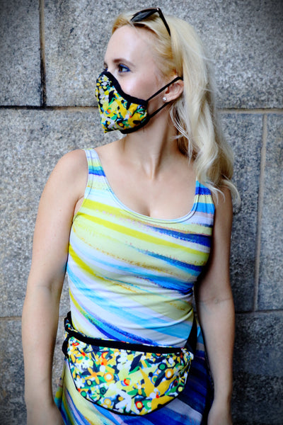 Annika Connor wearing the Avalon face Mask and fanny pack and the Because of You Dress