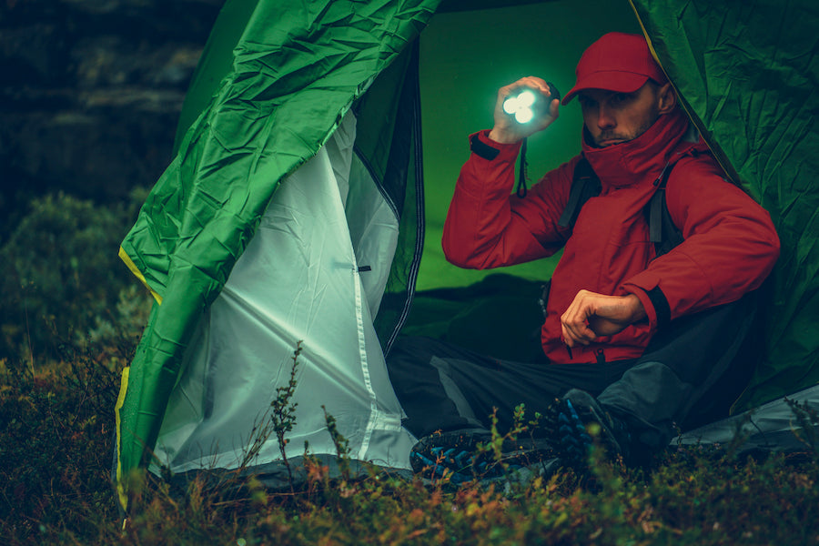 camping flashlight dusk