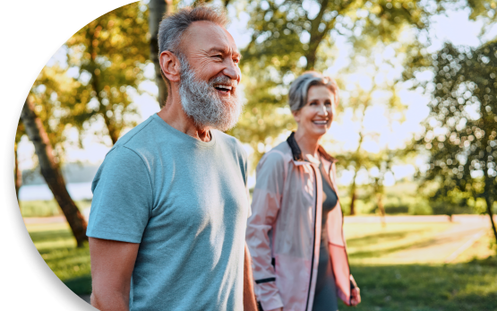 old man and old women with gym clothes are walking parks