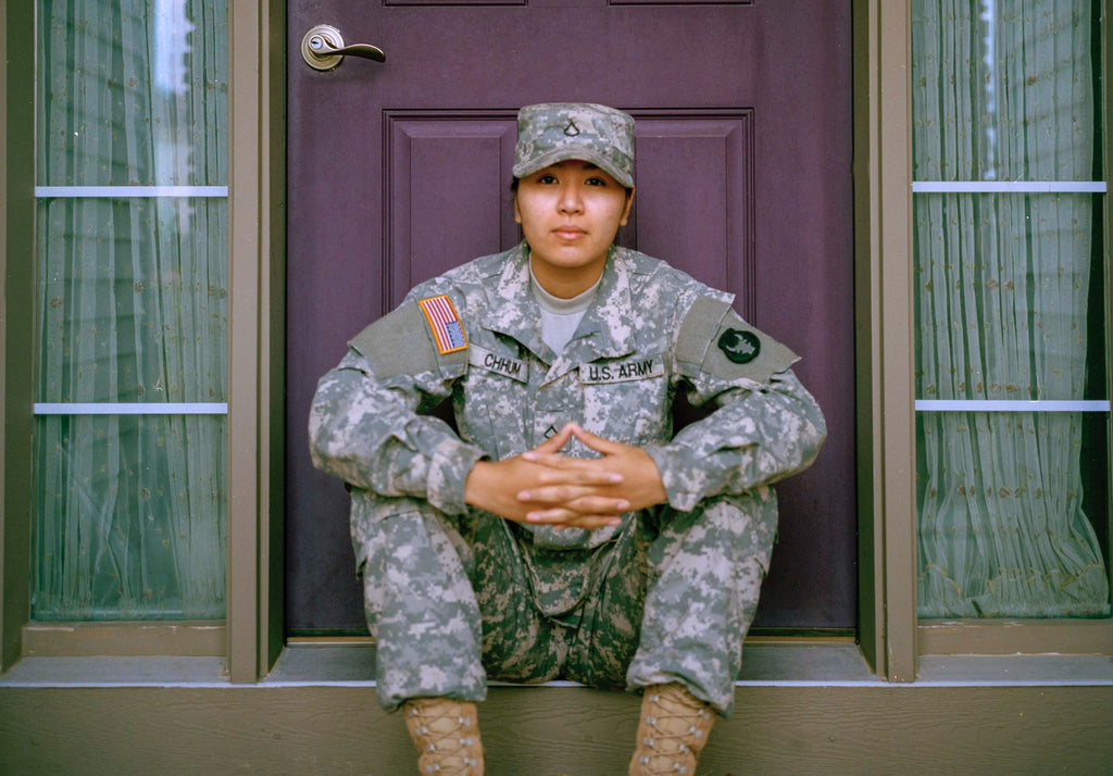 woman in military uniform hearing aids covered by tricare