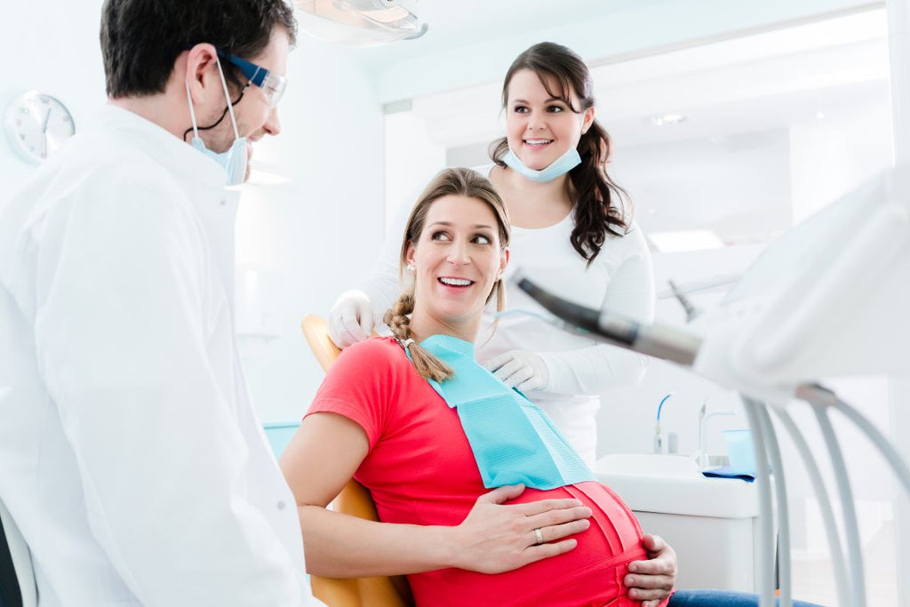 pregnant woman on dental clinic