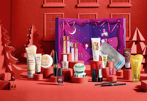 Avon's 24 Day Beauty Advent Calendar with all products displayed in front of the box against a red background.