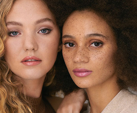 Two models showing natural make-up.